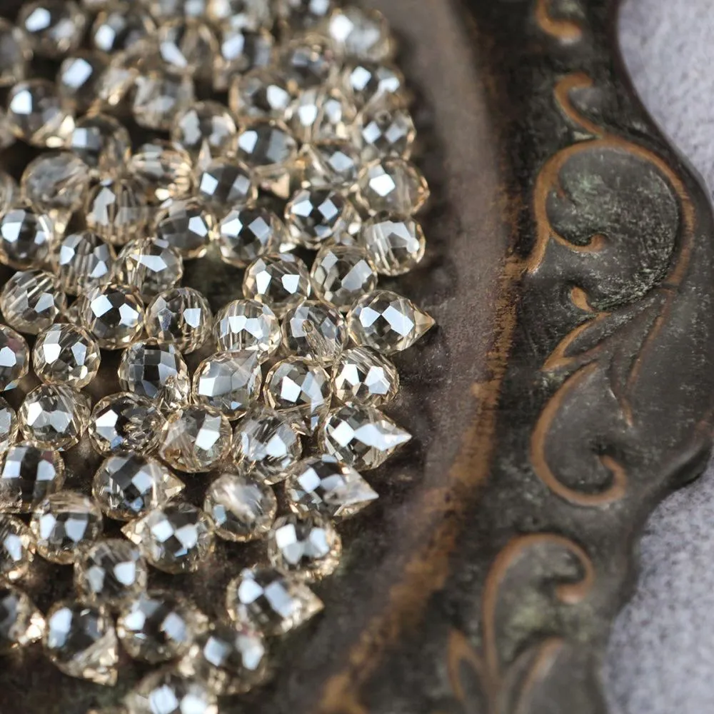 бусина "капля", граненая, стекло, цвет шампанского, 10-11x8 мм